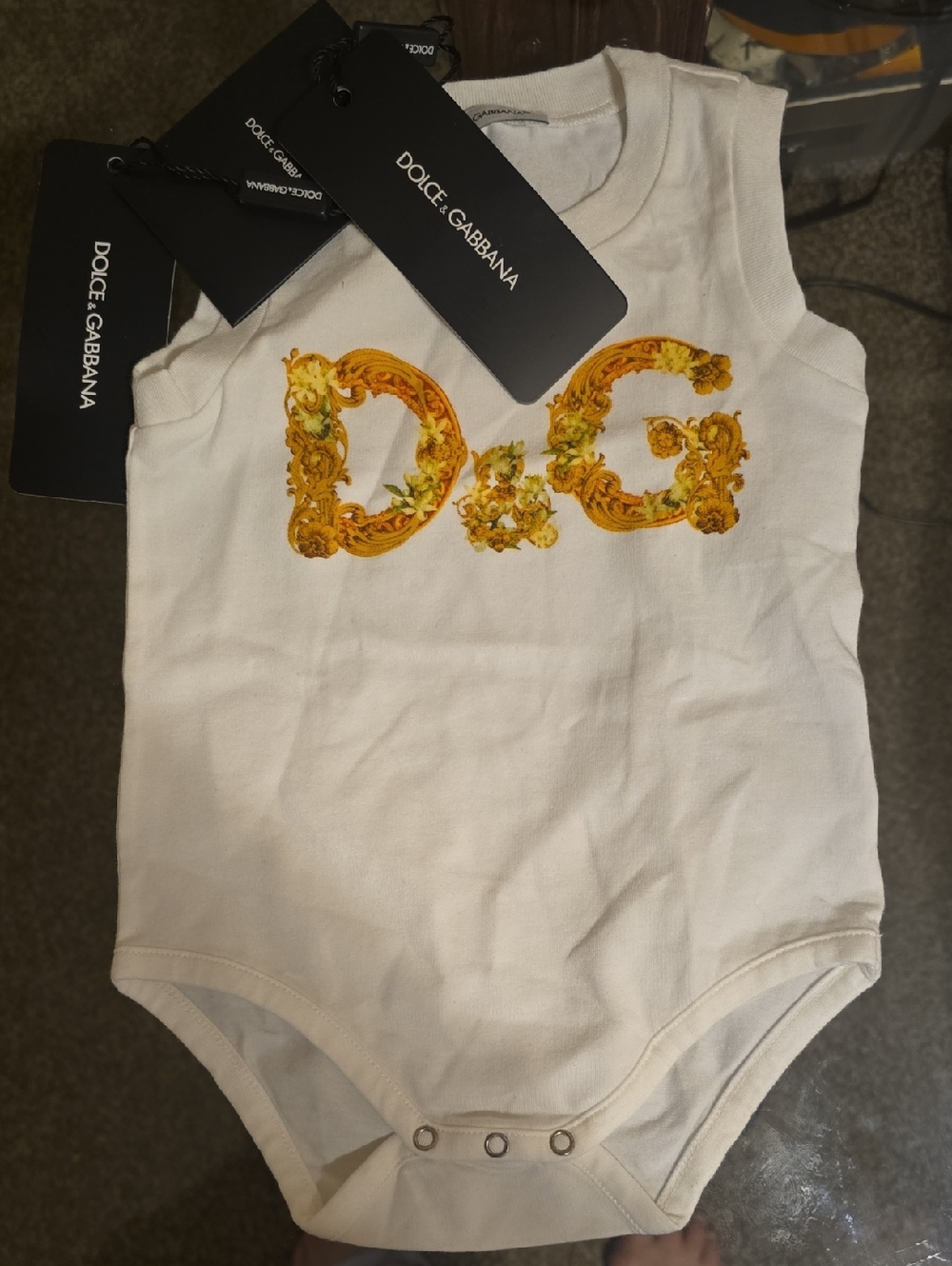 Dolce & Gabbana White Baby Bodysuit with Gold Floral DG